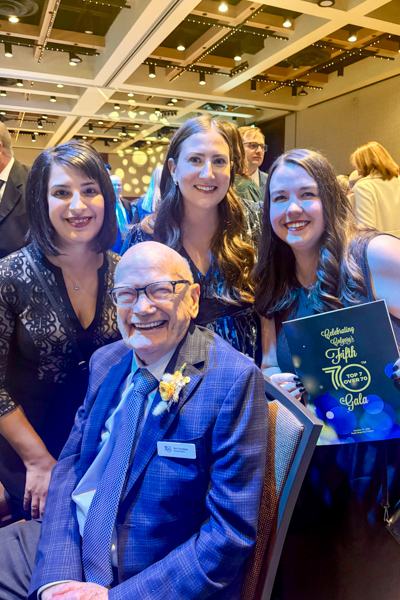 Ron Freckleton with Danisha Bhaloo-Shivji, Bryn Stagg and Holly Jenkins with UWCA’s Engagement Team.