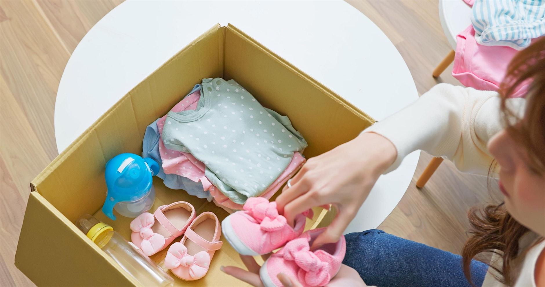 A woman sorts through clothing