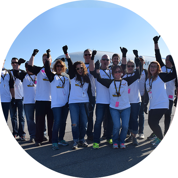 A plane pull team cheering.